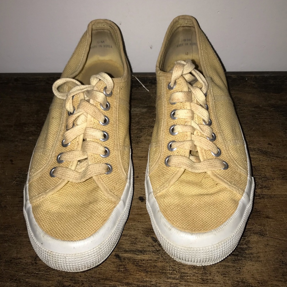 Yellow low top Ann Taylor shoes.